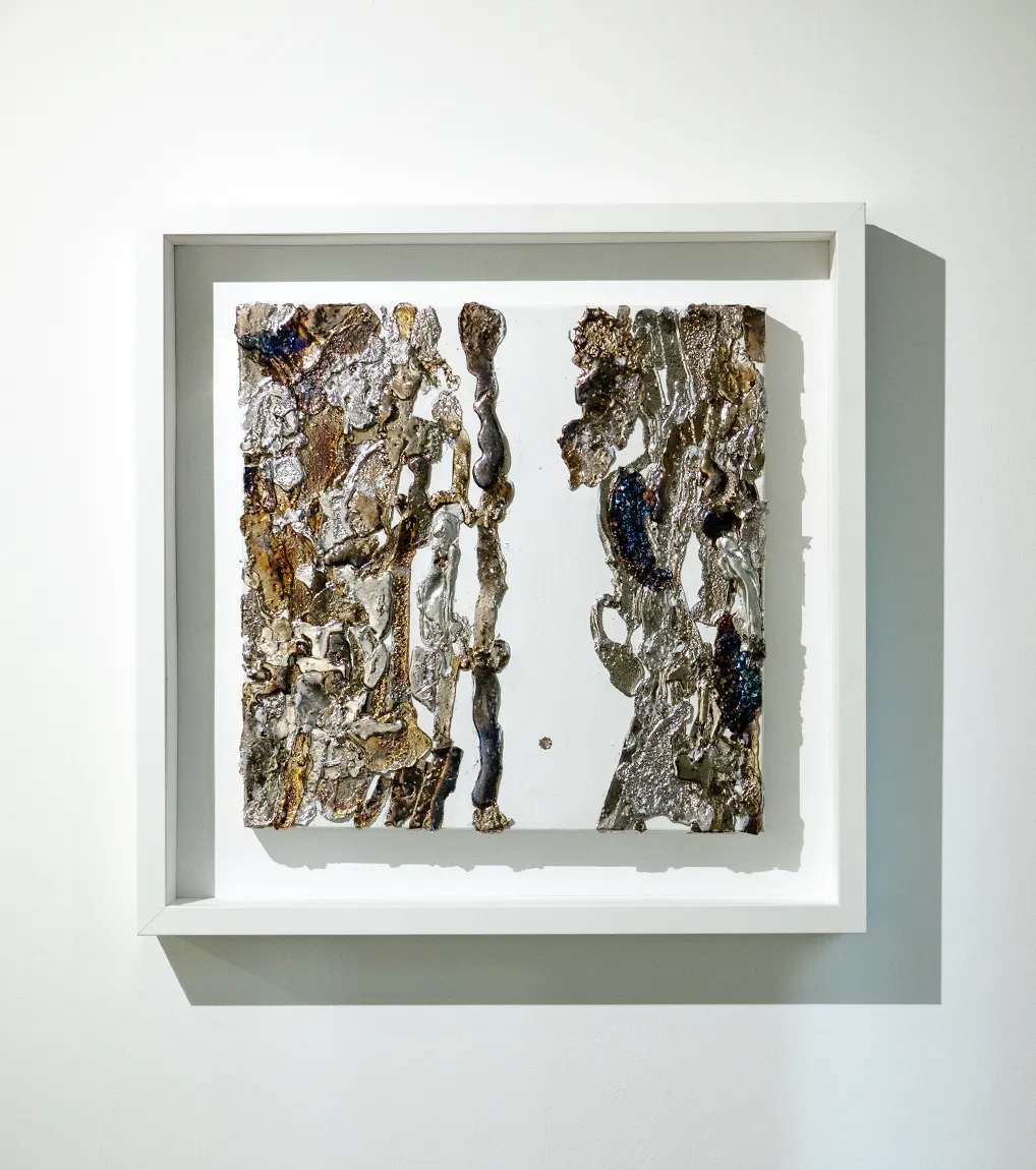 A frontal installation view of ‘A Study for Half-Life’ (2023) by Damian Boylan. A painting from his Elements Paintings series using molten rare earth, bismuth metal on cotton canvas.
